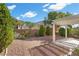 Landscaped backyard featuring a covered patio area at 2158 Indigo Creek Ave, Henderson, NV 89012