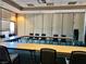 Spacious conference room with modern tables and chairs plus natural light at 2158 Indigo Creek Ave, Henderson, NV 89012