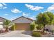 Charming single-story home with a well-maintained front yard and an inviting garage at 2158 Indigo Creek Ave, Henderson, NV 89012