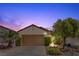 Charming single-story home with a well-maintained front yard and an inviting garage at 2158 Indigo Creek Ave, Henderson, NV 89012