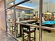 Game room featuring billiards table and comfortable seating with a sophisticated design at 2158 Indigo Creek Ave, Henderson, NV 89012