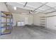 Spacious garage includes shelving and laundry hookups at 2158 Indigo Creek Ave, Henderson, NV 89012