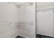 White shelving and ample storage in a spacious walk-in closet at 2158 Indigo Creek Ave, Henderson, NV 89012