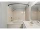 Bathroom featuring a tiled tub and shower combination at 2200 S Fort Apache Rd # 1033, Las Vegas, NV 89117