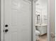 Bathroom view from doorway, showcasing vanity, toilet, and tile flooring at 2200 S Fort Apache Rd # 1033, Las Vegas, NV 89117