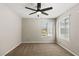 Bedroom with carpet, ceiling fan, and large windows at 2200 S Fort Apache Rd # 1033, Las Vegas, NV 89117