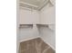 Walk-in closet with built-in shelves and carpeted floor at 2200 S Fort Apache Rd # 1033, Las Vegas, NV 89117