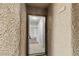 View through the front door, showing the tile entryway and the hallway beyond at 2200 S Fort Apache Rd # 1033, Las Vegas, NV 89117