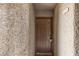 A close up shot of the unit's front door and the address number above the door at 2200 S Fort Apache Rd # 1033, Las Vegas, NV 89117