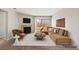 Comfortable living room features a fireplace, contemporary furnishings and opens to the outside deck at 2200 S Fort Apache Rd # 1033, Las Vegas, NV 89117