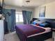 Cozy bedroom with a large bed and window; soft natural light makes the room more inviting at 2229 Steele St, Las Vegas, NV 89156