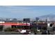 View of an AutoZone in the neighborhood with city views in the background at 2229 Steele St, Las Vegas, NV 89156