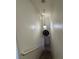 Stairway with pendant lighting, decorative wall clock, and neutral paint at 2229 Steele St, Las Vegas, NV 89156