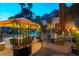 Backyard patio area with ambient lighting and outdoor seating, perfect for evening gatherings at 2232 Le Conte Ave, Henderson, NV 89074