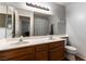 Bright bathroom offers a dual sink vanity and a shower/tub combo at 2232 Le Conte Ave, Henderson, NV 89074
