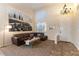Inviting living room with high ceilings, a plush leather sofa, and stylish decor at 2232 Le Conte Ave, Henderson, NV 89074