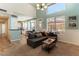 Bright living room features large windows, high ceilings and neutral tones throughout the space at 2232 Le Conte Ave, Henderson, NV 89074