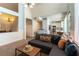 Spacious living room with open layout to kitchen, dining area, and comfortable seating at 2232 Le Conte Ave, Henderson, NV 89074