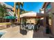 Spacious patio area with outdoor seating, adjacent to a pool and perfect for relaxation at 2232 Le Conte Ave, Henderson, NV 89074