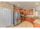 Well-lit kitchen featuring stainless steel appliances and beautiful granite countertops at 2264 Steamers Ave # 102, Las Vegas, NV 89183