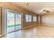 Open living space featuring tile floors, backyard access, and ample natural light at 2264 Steamers Ave # 102, Las Vegas, NV 89183