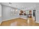 Open-concept living room and kitchen area with recessed lights and natural lighting at 2432 Granada Bluff Ct, Las Vegas, NV 89135