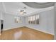 Bright living room with wood floors, a fireplace and plantation shutters at 2432 Granada Bluff Ct, Las Vegas, NV 89135