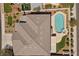 Stunning aerial view of a home with a backyard featuring a pool and well-manicured landscaping at 2647 Hourglass Dr, Henderson, NV 89052
