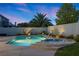 Backyard pool and spa with mature landscaping, enhancing privacy and tranquility at 2647 Hourglass Dr, Henderson, NV 89052