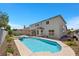 Stunning backyard pool and spa, ideal for outdoor entertaining and relaxation at 2647 Hourglass Dr, Henderson, NV 89052