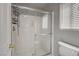 Modern bathroom featuring a glass-enclosed shower and toilet at 2679 Regency Cove Ct, Las Vegas, NV 89121
