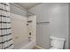 Bathroom with a shower-tub combo, toilet, and towel bar at 2679 Regency Cove Ct, Las Vegas, NV 89121