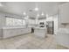 Bright kitchen with white cabinets, stainless steel appliances, and a center island at 2679 Regency Cove Ct, Las Vegas, NV 89121