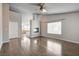 Bright living room with hardwood floors and fireplace offers a warm and inviting atmosphere at 2679 Regency Cove Ct, Las Vegas, NV 89121