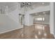 Spacious living area with high ceilings, staircase, and abundant natural light at 2679 Regency Cove Ct, Las Vegas, NV 89121