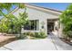 Charming single-story home with well-maintained landscaping, a tiled roof, and beautiful curb appeal at 2837 Du Barry Manor Ln, Las Vegas, NV 89108