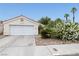 Charming single-story home with a two-car garage, desert landscaping, and traditional-style roofline at 2837 Du Barry Manor Ln, Las Vegas, NV 89108