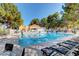 Resort style community pool with ample seating for residents to enjoy the sun at 2851 S Valley View Blvd # 1196, Las Vegas, NV 89102