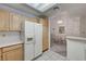 Spacious kitchen with white countertops, ample cabinet space, and dining area view at 2851 S Valley View Blvd # 1196, Las Vegas, NV 89102