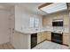 Functional kitchen with white countertops, black appliances, and ample cabinet space at 2851 S Valley View Blvd # 1196, Las Vegas, NV 89102