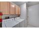 Functional laundry room equipped with a washer and dryer for your convenience at 2851 S Valley View Blvd # 1196, Las Vegas, NV 89102