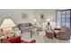 Comfortable living room with neutral carpet, ample seating, and bright lamps at 2851 S Valley View Blvd # 1196, Las Vegas, NV 89102