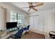 Well-lit office with large window, ceiling fan, closet, and two work stations at 2851 S Valley View Blvd # 1196, Las Vegas, NV 89102