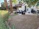 Spacious backyard featuring an outdoor seating area and lush greenery, perfect for outdoor gatherings at 2989 Bel Air Dr, Las Vegas, NV 89109
