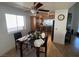 Charming kitchen and dining area with dark wood cabinets, stainless steel appliances, and a cozy breakfast nook at 2989 Bel Air Dr, Las Vegas, NV 89109