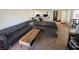 Comfortable living room featuring a large gray sectional sofa and stylish coffee table with storage space at 2989 Bel Air Dr, Las Vegas, NV 89109