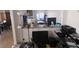 This is a view of an indoor office area with computers, printers and granite counters at 2989 Bel Air Dr, Las Vegas, NV 89109