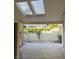 Outdoor patio featuring two skylights and greenery at 2989 Bel Air Dr, Las Vegas, NV 89109