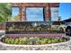 Entrance to the prestigious Las Vegas Country Club Estates with stone sign and manicured landscaping at 2989 Bel Air Dr, Las Vegas, NV 89109