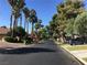 Quiet, tree-lined street showcasing well-maintained homes and manicured lawns at 2989 Bel Air Dr, Las Vegas, NV 89109